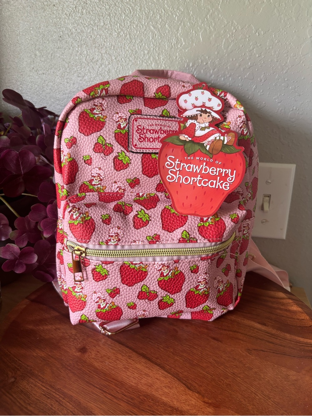 pink strawberry-patterned mini backpack by Fast Forward